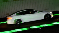 UK road test charging cars while driving.